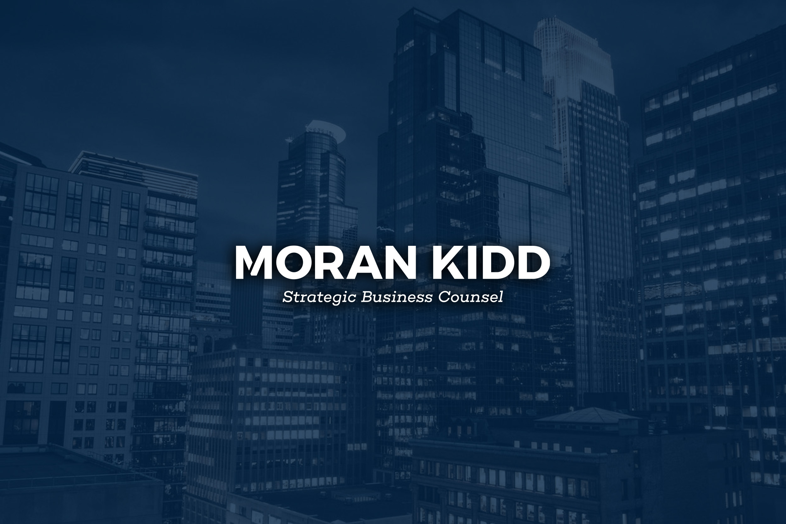 MoranKidd logo on top of city scape.